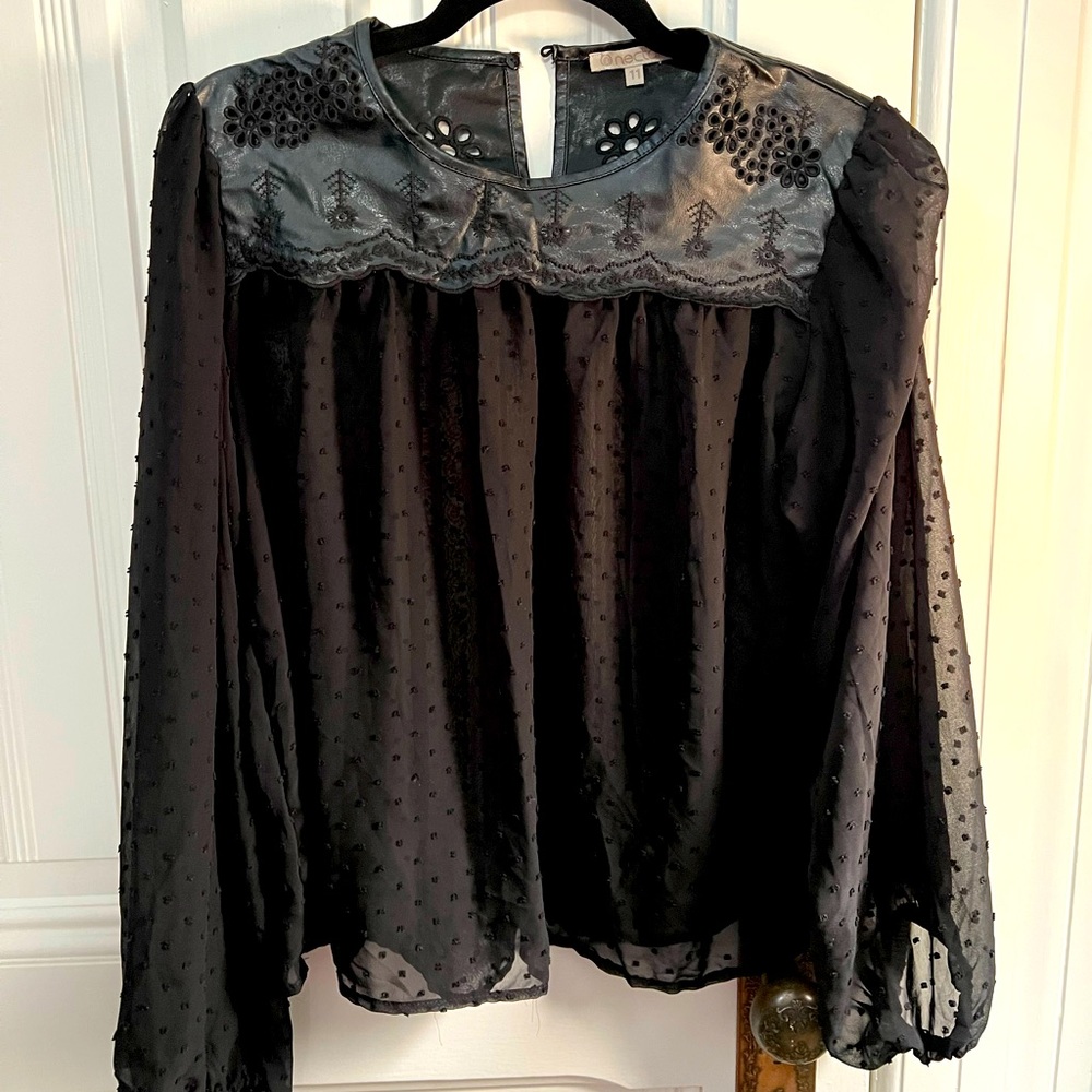 Sheer lace top with faux leather details